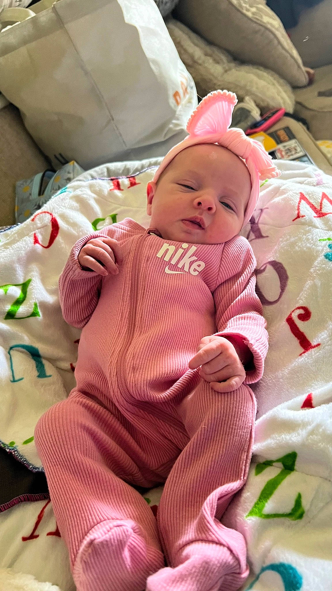 Adelynn Renee Hurt is registered to the contest to win money with this photo: baby, baby_products, baby_sleeping, baby_toddler_clothing, bedding, carmine, cheek, child, comfort, linens, nightwear, pattern, person, pillow, pink, skin, sleeve, smile, textile, toddler
