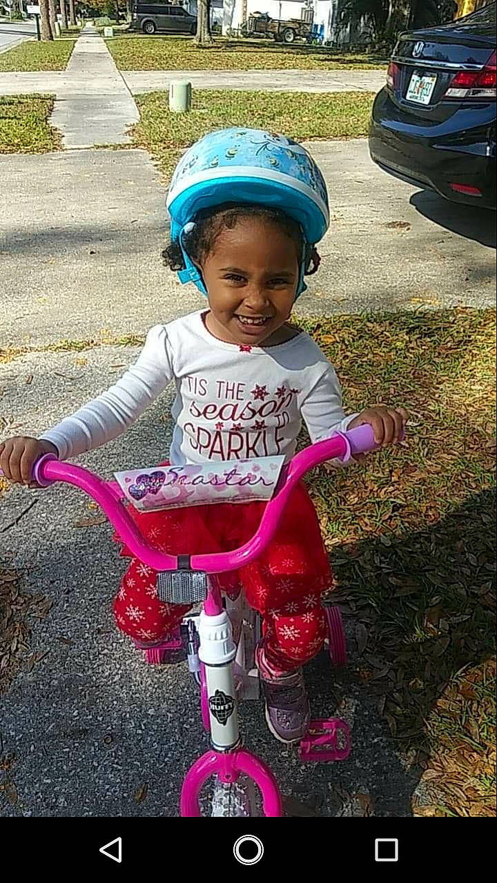 Tatiana joined the competition — help win amazing prizes! bicycle, bicycle_accessory, child, joy, person, pink, recreation, riding_toy, sports_equipment, toddler, training_wheels, vehicle, wheel