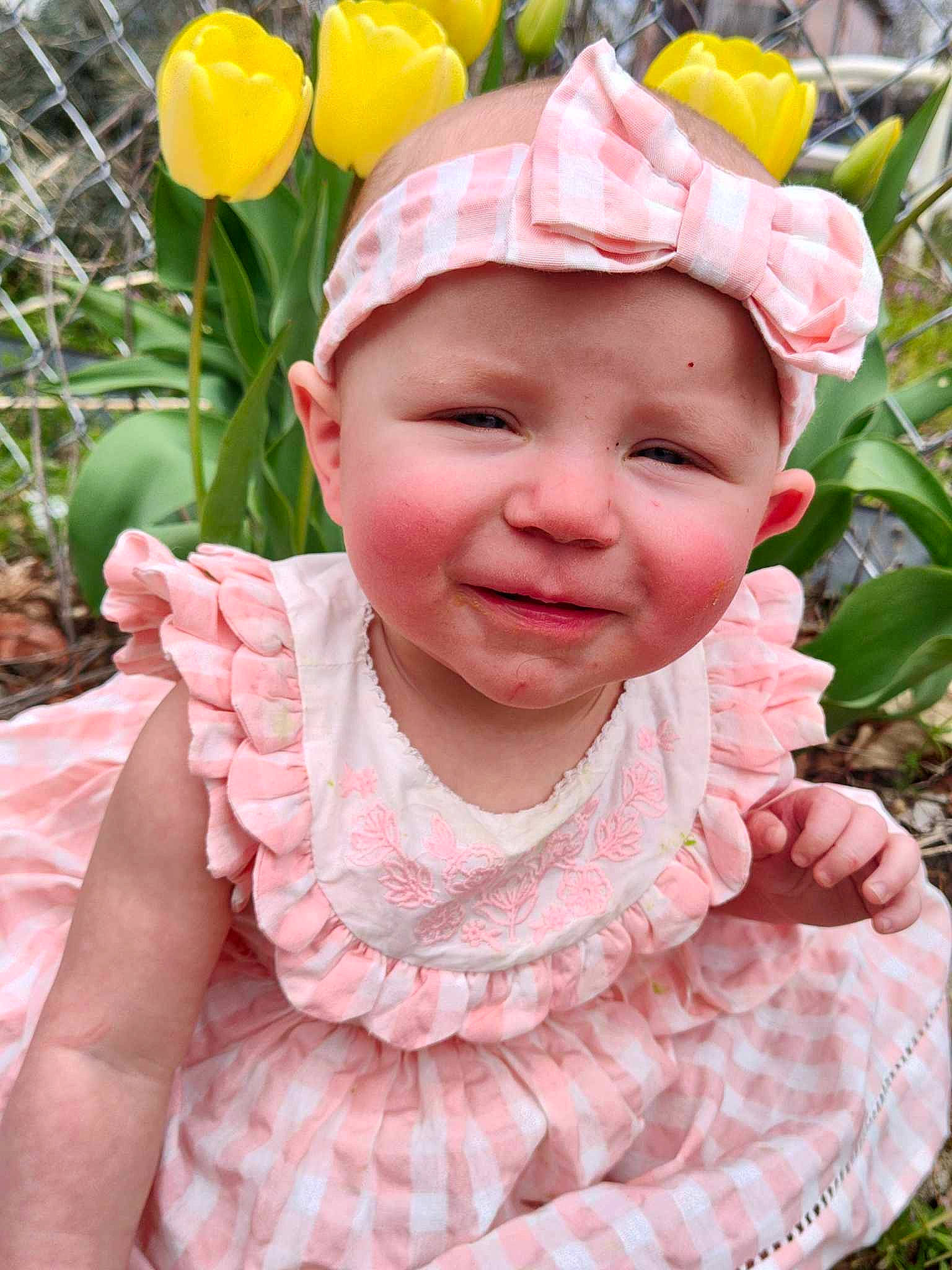 Charolette joined the competition — help win amazing prizes! baby, baby_toddler_clothing, botany, cap, child, dress, flower, fun, grass, happy, headgear, headwear, joy, lip, organ, people_in_nature, person, petal, pink, plant
