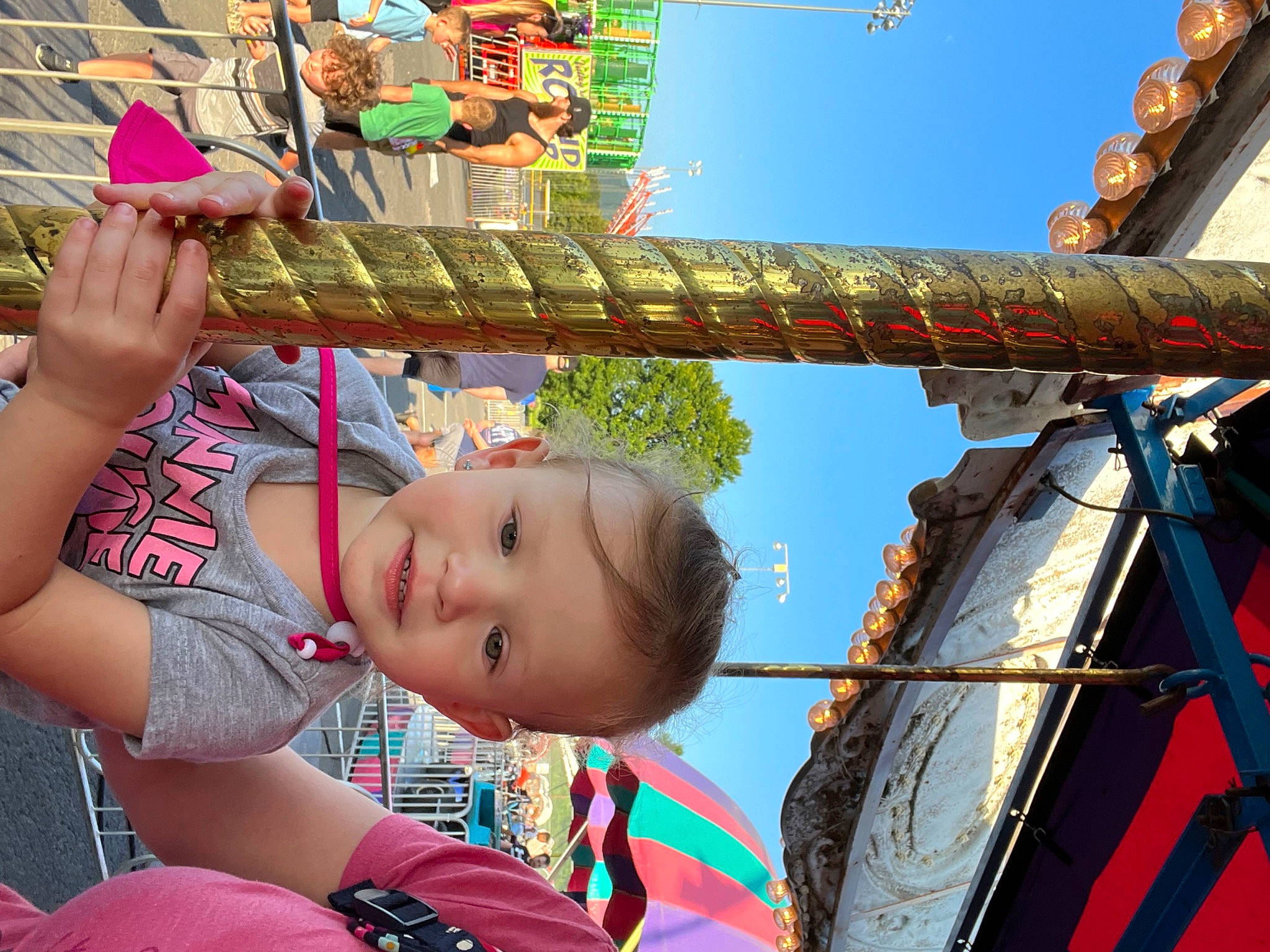 Anna joined the competition — help win amazing prizes! amusement_ride, child, city, fun, green, happy, joy, leisure, outdoor_play_equipment, person, photograph, play, playground, recreation, sky, smile, snapshot, summer, t_shirt, toddler