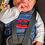 Nolan participe au concours pour gagner de l'argent avec cette photo : baby, child, car_seat, denim, batman_logo, smile, blue_eyes, infant, safety_harness, cute, happy, hand, clothing, seatbelt, portrait, indoor, person, small_child, face, young