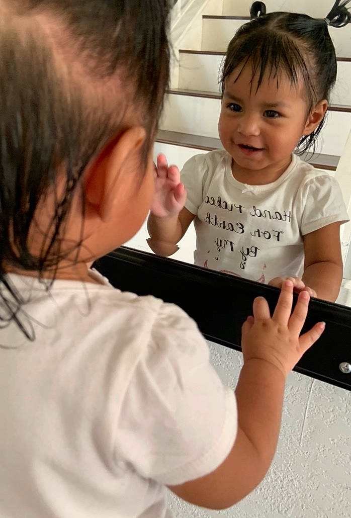 Amorè Nylah is registered to the contest to win money with this photo: arm, baby, child, ear, electronic_device, forehead, hairstyle, joint, learning, nose, person, play, reading, skin, technology, toddler