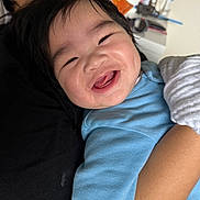 Kai joined the competition — help win amazing prizes! arm, baby, blue_outfit, child, closeup, clothing, cute, expression, face, hair, happy, holding, human, indoor, infant, joy, person, portrait, skin, smile