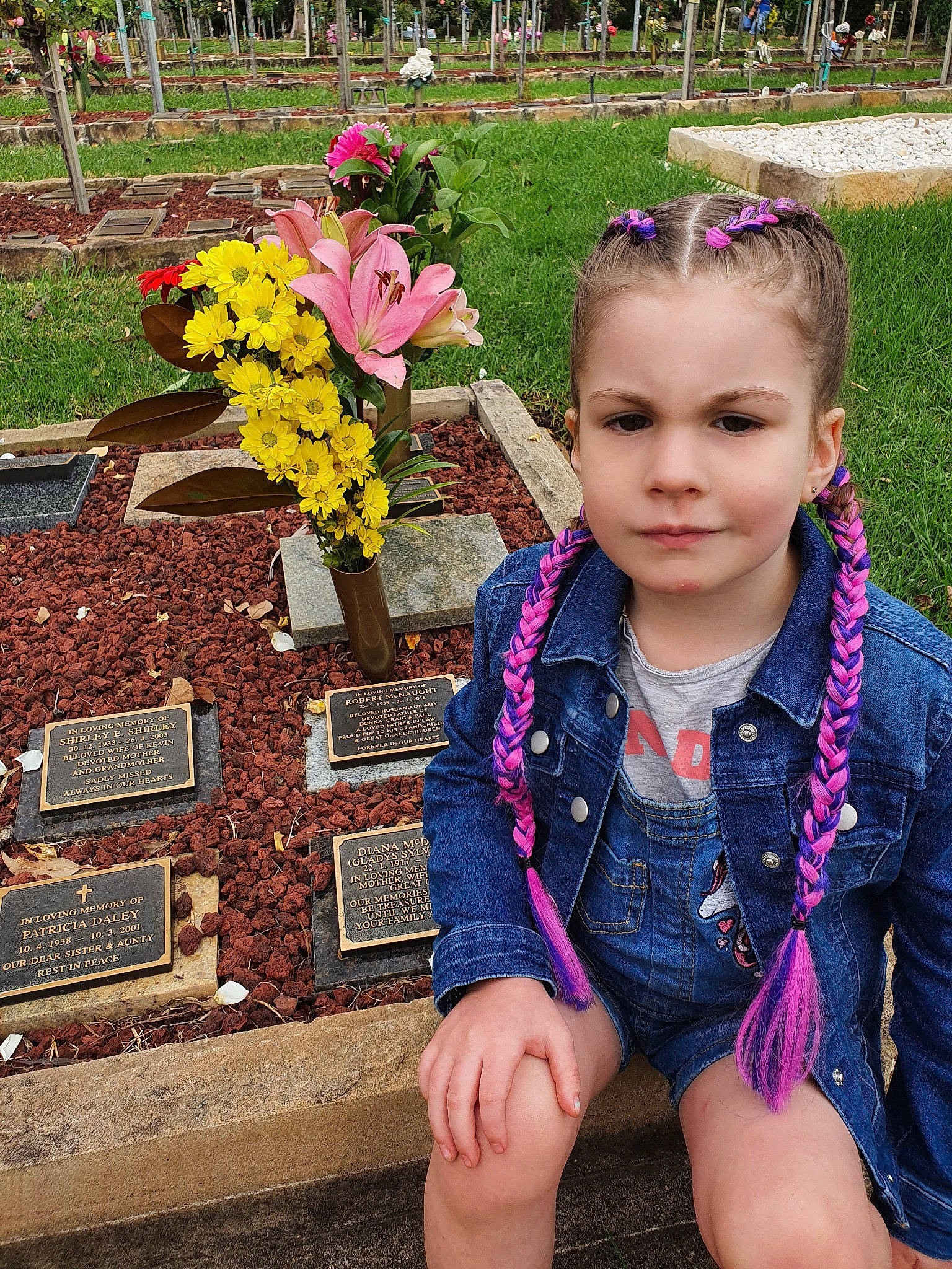Harper is registered to the contest to win money with this photo: blond, botany, child, child_model, eye, flower, grass, iris, leg, long_hair, person, pink, plant, purple, smile, spring, summer, toddler, violet_family, wildflower