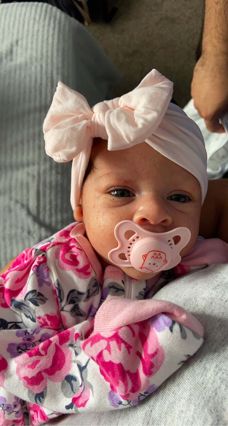 Maribel is registered to the contest to win money with this photo: baby, baby_products, baby_toddler_clothing, cheek, child, comfort, event, eyebrow, fun, happy, headgear, headwear, human_body, iris, linens, lip, mouth, nose, person, pink