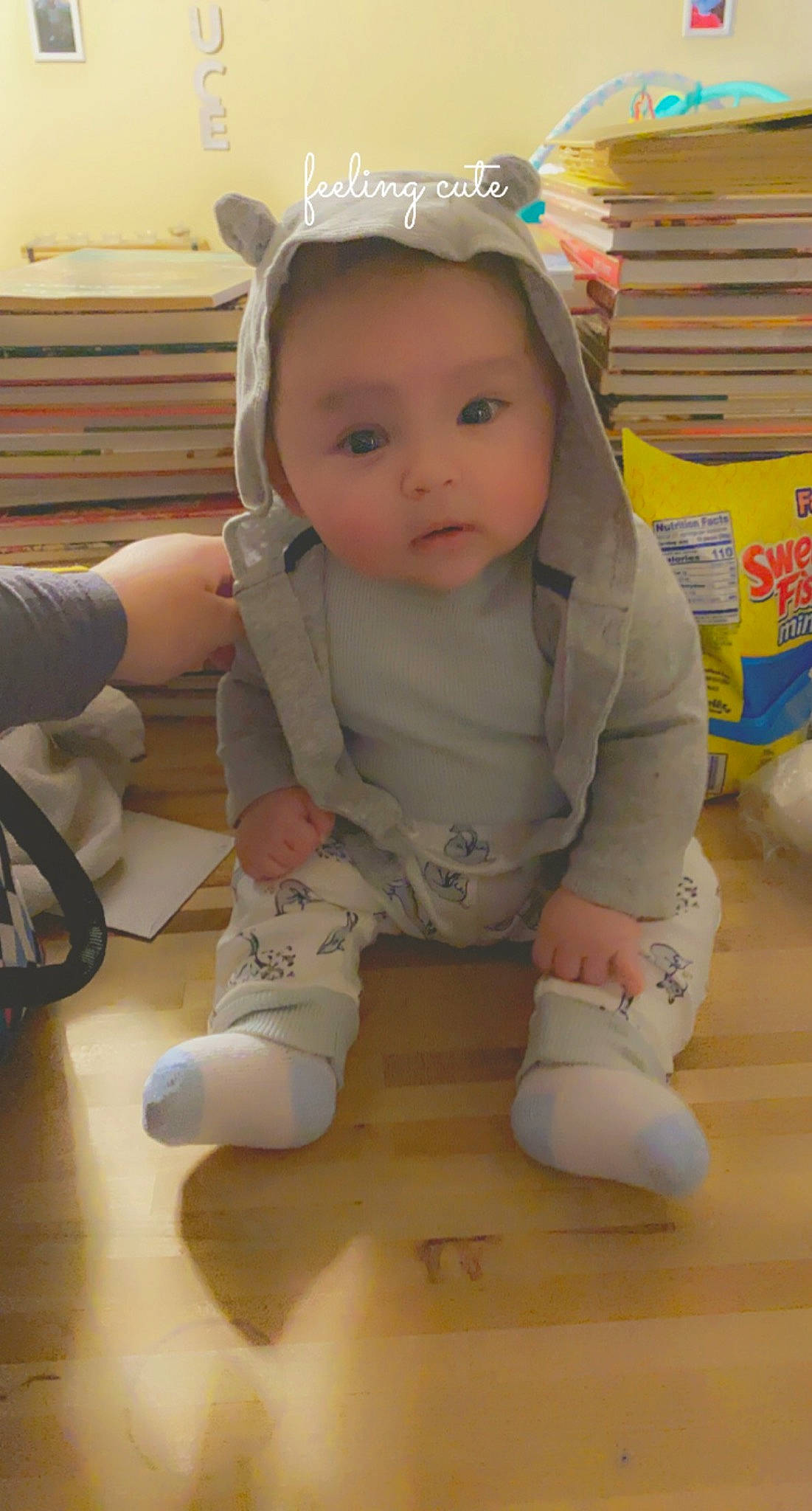 Jess joined the competition — help win amazing prizes! baby, baby_products, baby_toddler_clothing, cheek, child, eye, face, floor, flooring, foot, happy, head, headband, headpiece, human_leg, person, sitting, skin, sleeve, thumb