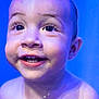 baby, blue_light, child, close_up, cute, expression, eyes, face, glowing, happy, head, innocence, joy, mouth, person, portrait, skin, smile, water_drops, young