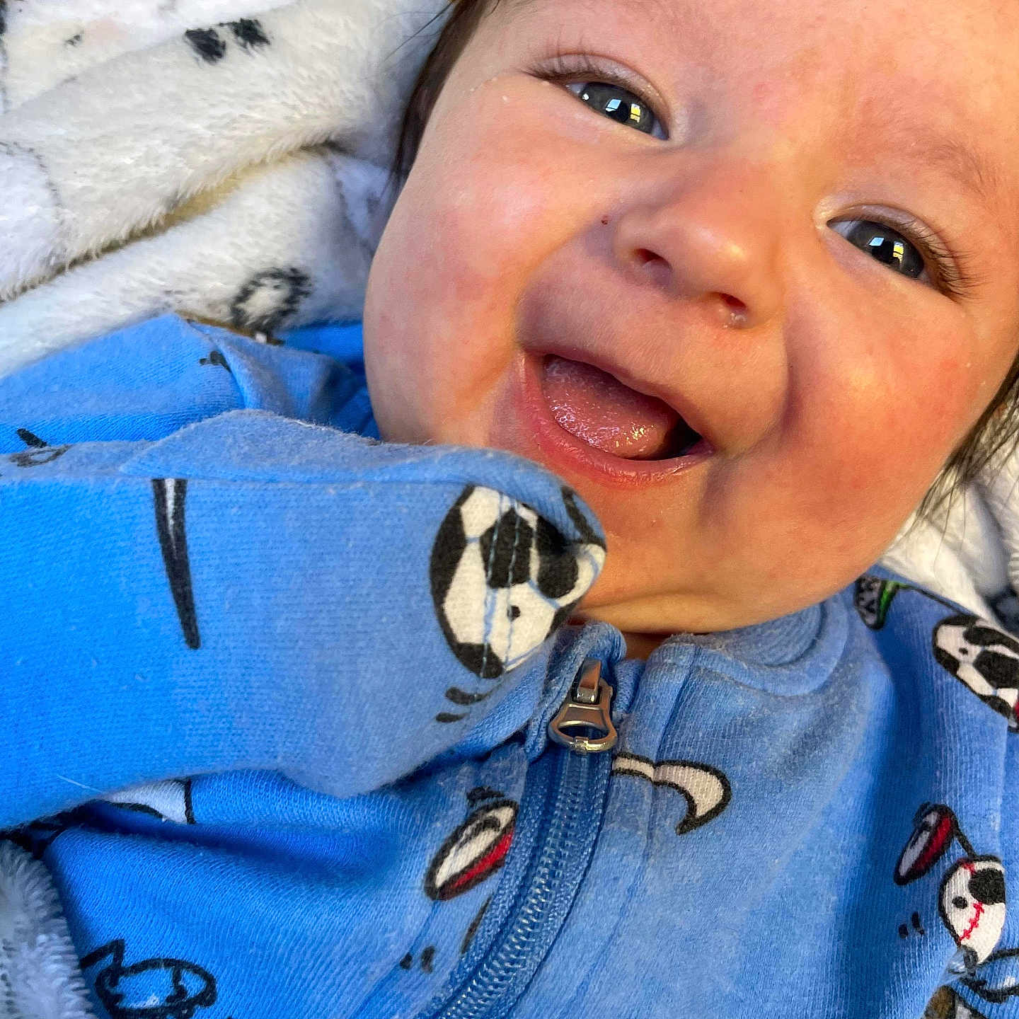 Liam is registered to the contest to win money with this photo: baby, babylaughing, bodypart, clothing, coat, face, happy, head, jacket, jeans, knitwear, laughing, mouth, pajamas, pants, person, photography, portrait, smile, sweater