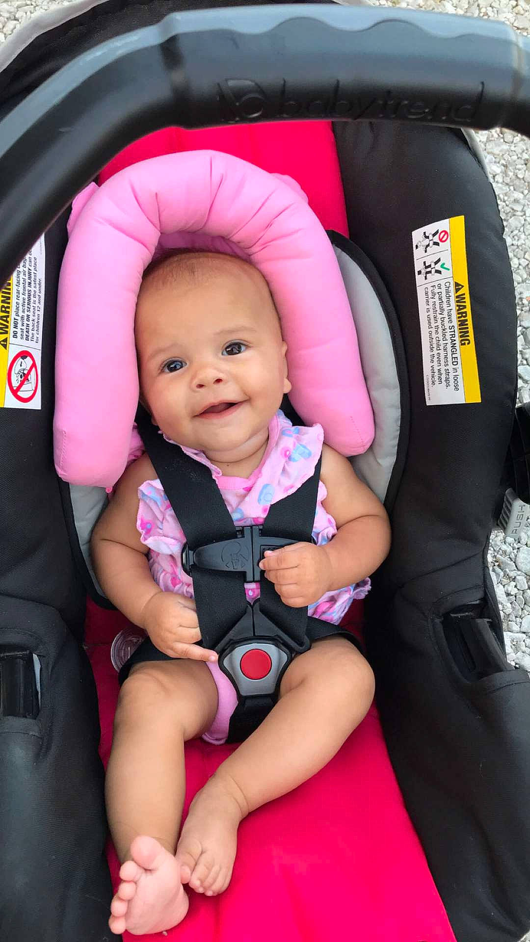 Brenley is registered to the contest to win money with this photo: auto_part, baby, baby_carriage, baby_carrier, baby_in_car_seat, baby_products, car_seat, car_seat_cover, child, joy, person, pink, product, seat_belt, toddler