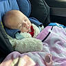 Louane a rejoint le concours — aidez-le/la à gagner de superbes lots ! baby, sleeping, car_seat, blanket, pacifier, child, infant, clothing, window, sunlight, car_interior, seatbelt, cozy, soft_texture, portrait, peaceful, cute, resting, travel, young_child