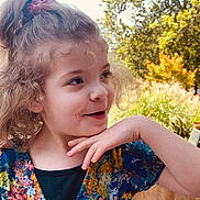 Brooklyn joined the competition — help win amazing prizes! child, girl, curly_hair, scrunchie, colorful_dress, outdoor, nature, greenery, dog, golden_retriever, pet, happy, playful, portrait, smiling, sunlight, tree, grass, person, casual_clothing