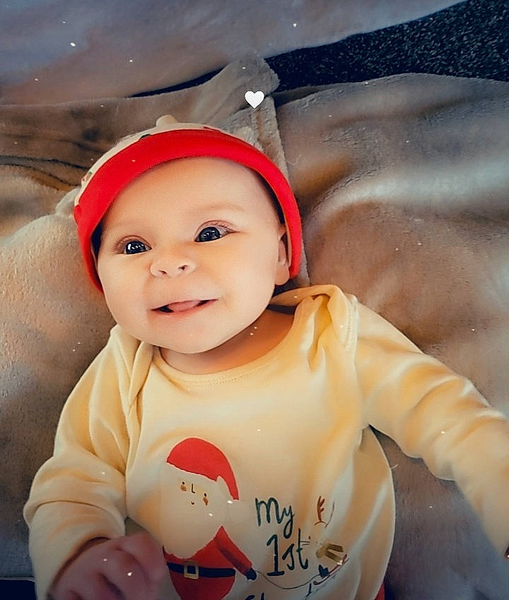 Jessica is registered to the contest to win money with this photo: baby, baby_toddler_clothing, cap, cheek, child, eye, flash_photography, fun, happy, head, headgear, headwear, iris, mouth, nose, people_in_nature, person, skin, sleeve, smile