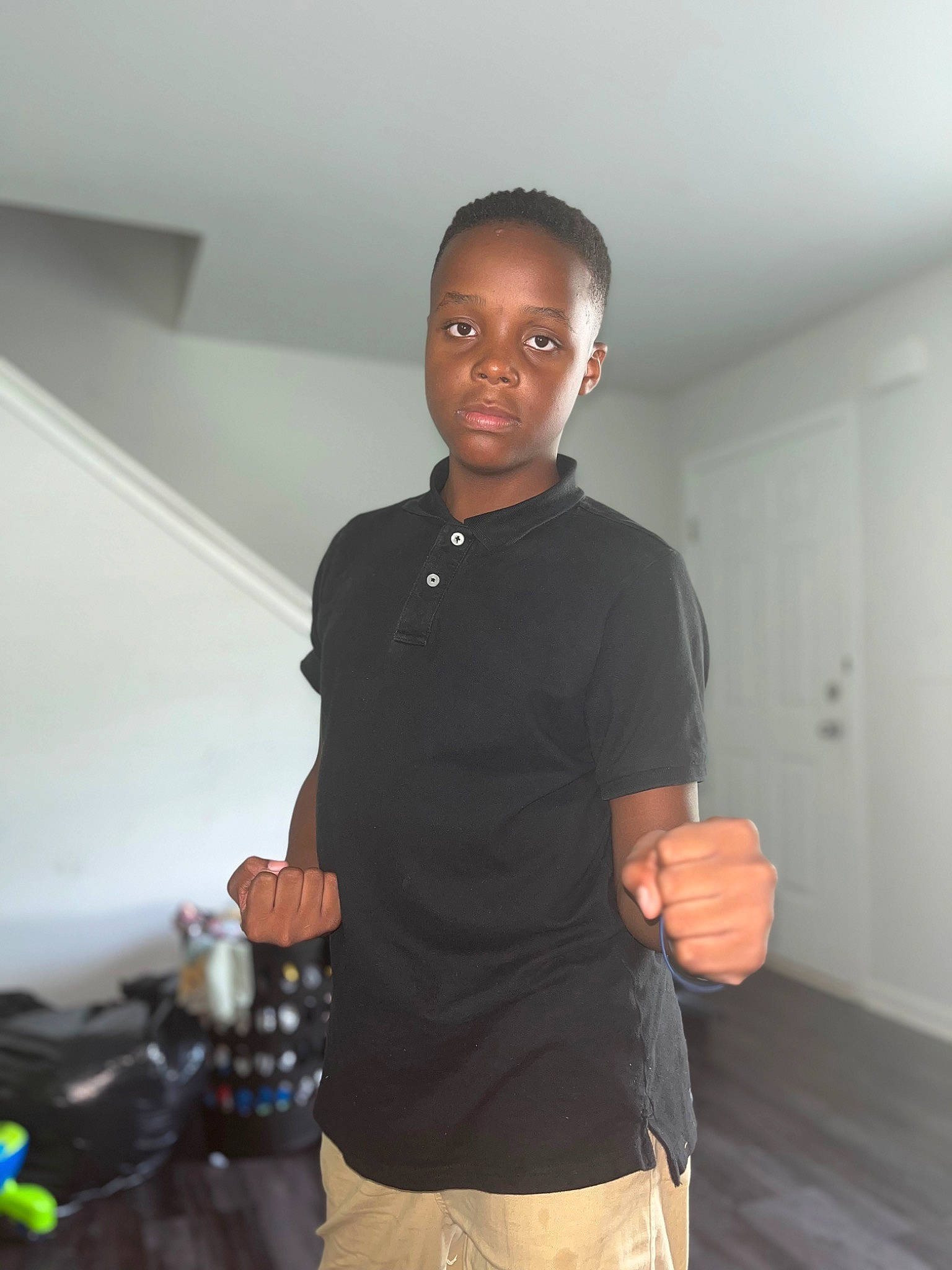 Kaleb joined the competition — help win amazing prizes! abdomen, bag, belt, camera, chest, elbow, eyewear, fashion_design, flooring, fun, gesture, knee, luggage_and_bags, person, single_lens_reflex_camera, sleeve, sportswear, t_shirt, trunk, video_camera