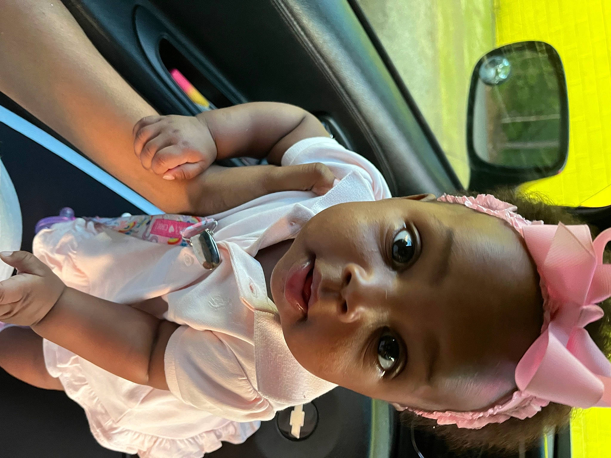 Jenice is registered to the contest to win money with this photo: auto_part, automotive_exterior, car, eyewear, family_car, fun, gesture, happy, hat, leisure, mirror, mouth, nose, person, smile, sunglasses, toddler, vehicle, vehicle_door, water