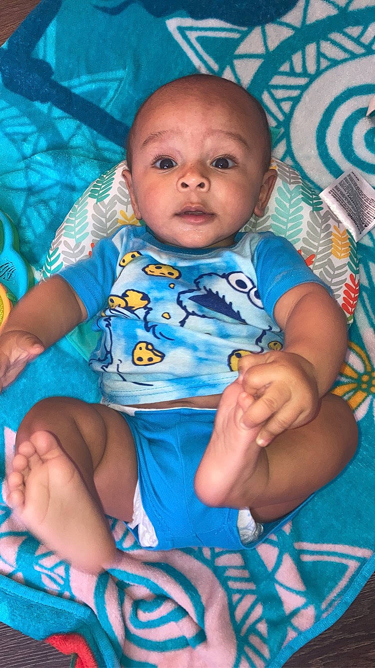 Davis joined the competition — help win amazing prizes! aqua, azure, baby, baby_toddler_clothing, blue, cheek, child, eye, fun, happy, iris, linens, mouth, nose, person, pink, purple, skin, sleeve, t_shirt