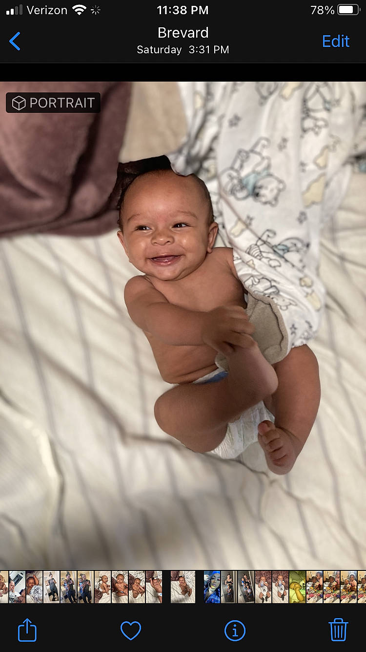 Davis is registered to the contest to win money with this photo: adaptation, baby, barechested, cheek, chest, child, flash_photography, font, happy, jewellery, joy, mammal, muscle, pattern, person, photo_caption, portrait_photography, screenshot, skin, smile