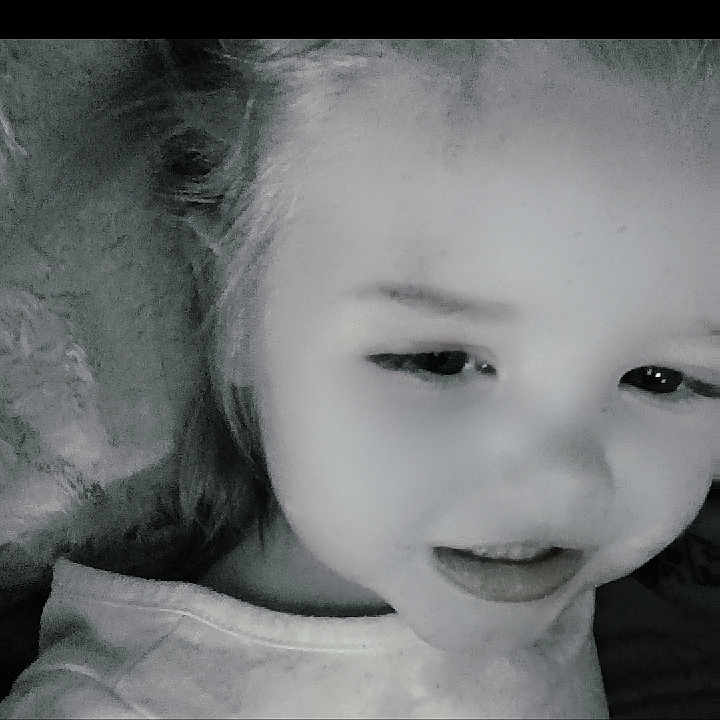 Scarlett joined the competition — help win amazing prizes! child, face, black_and_white, portrait, smile, young, close_up, head, hair, light, soft_expression, vignette, monochrome, person, cute, indoors, childhood, innocence, happy, baby
