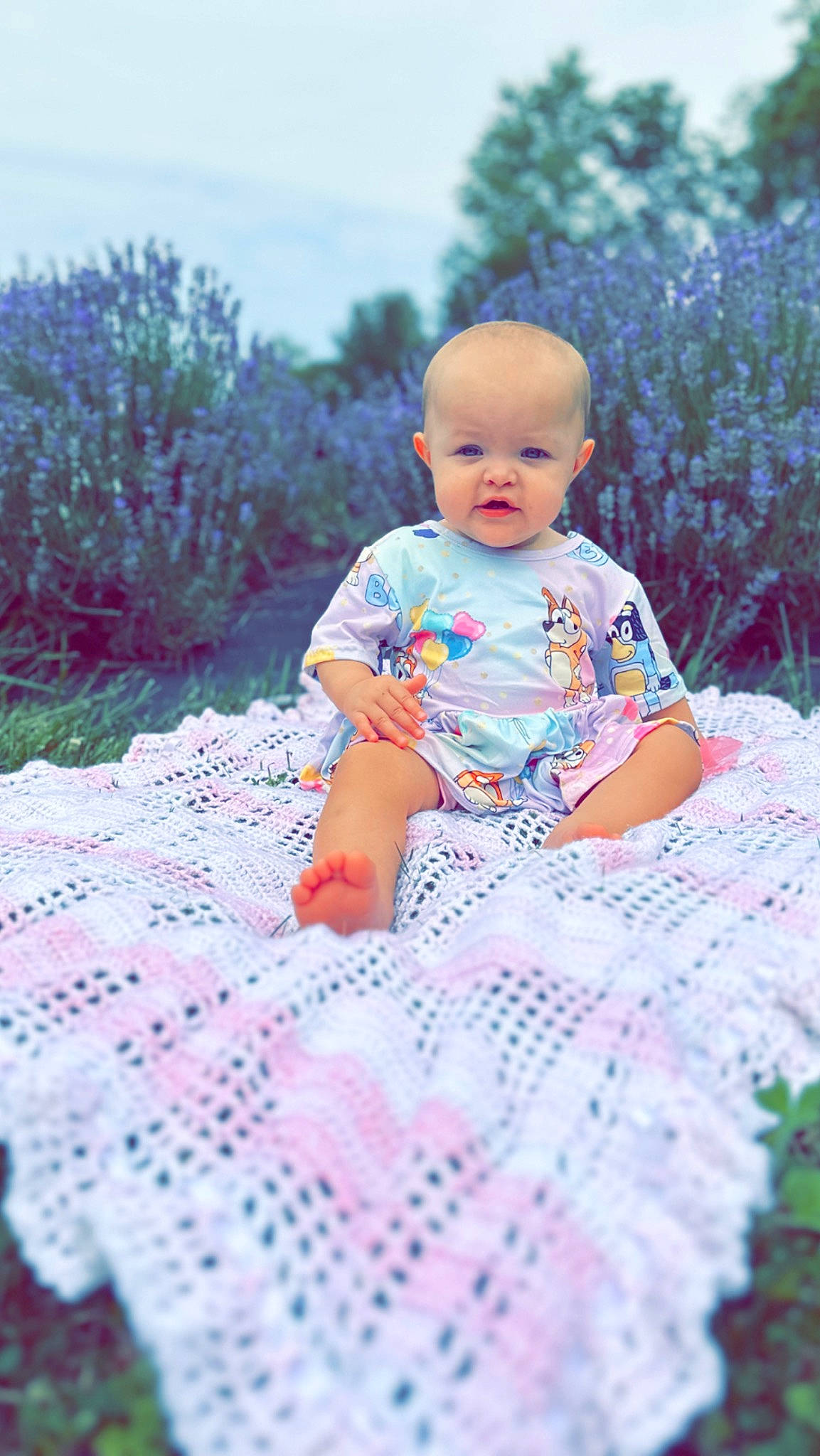 Alaina is registered to the contest to win money with this photo: baby, baby_toddler_clothing, child, doll, fun, grass, happy, landscape, leaf, leisure, magenta, pattern, people_in_nature, person, pink, plant, purple, sky, toddler, toy