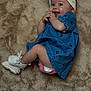 baby, infant, child, blue_dress, headband, white_booties, diaper, soft_surface, fluffy_rug, cute, smiling, happy, laying_down, cherry_pattern, portrait, indoor, skin, hands, feet, expression