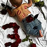 Eden participe au concours pour gagner de l'argent avec cette photo : baby, infant, back, jeans, rose, flower, red_lipstick, lipstick_marks, rose_petals, white_blanket, skin, barefoot, lying_down, milestone, birthday, cute, floral, portrait, baby_clothing, toddler