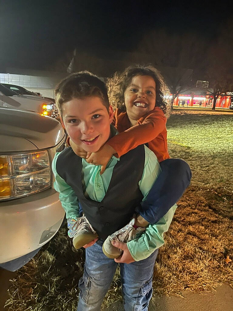 Debriana joined the competition — help win amazing prizes! automotive_exterior, automotive_lighting, bumper, car, event, flash_photography, fun, gesture, grass, grille, happy, headlamp, hood, jeans, joy, landscape, leisure, motor_vehicle, person, personal_luxury_car