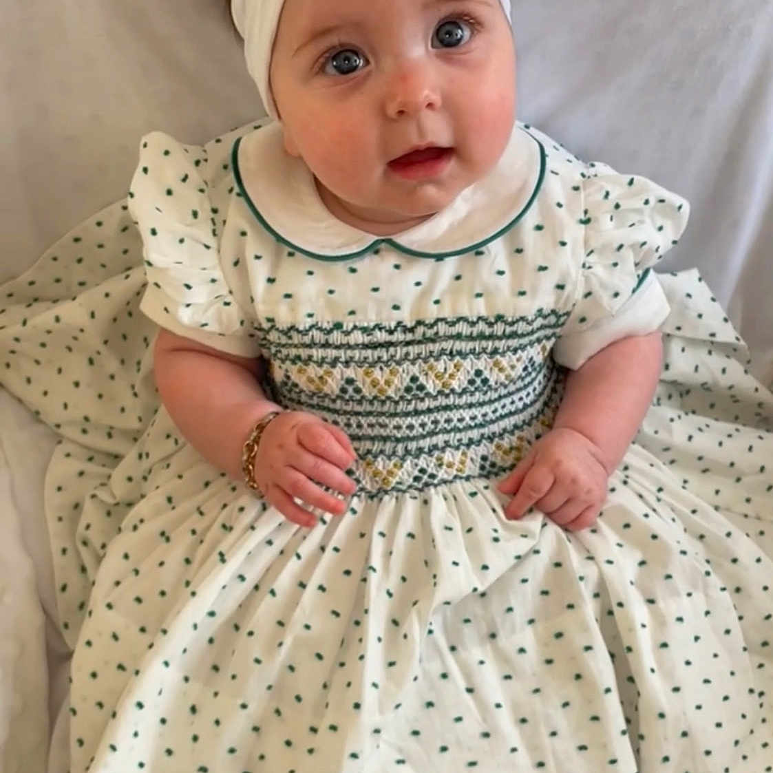 Dolly joined the competition — help win amazing prizes! accessories, baby, babylaughing, clothing, cushion, dress, face, happy, head, headband, homedecor, person, photography, portrait, sitting, sleeve, smile