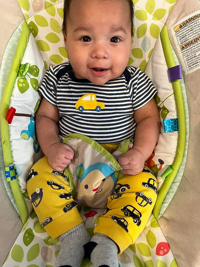 Takoda is registered to the contest to win money with this photo: baby, baby_products, baby_toddler_clothing, cheek, child, comfort, eye, face, facial_expression, happy, head, person, photograph, product, skin, sleeve, smile, t_shirt, textile, toddler