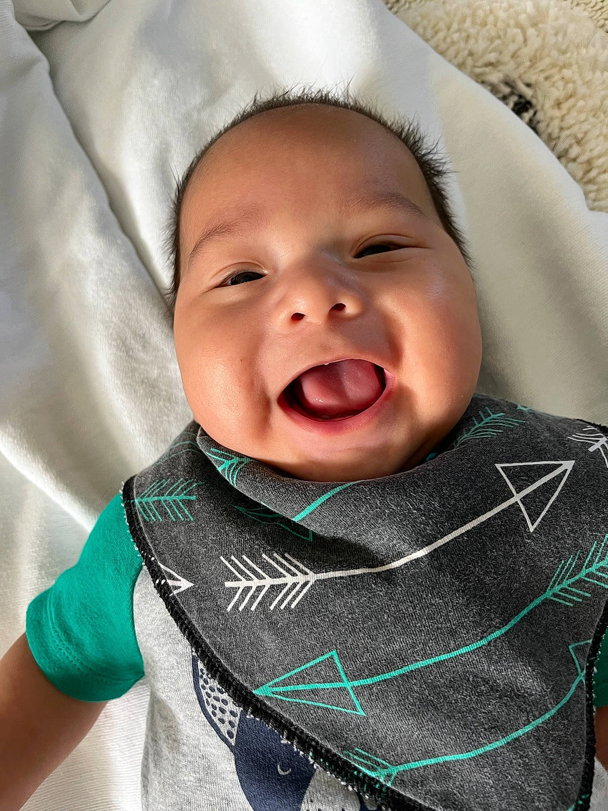 Takoda is registered to the contest to win money with this photo: baby, cheek, chin, comfort, eye, eyebrow, face, happy, head, headgear, iris, lip, mouth, nose, person, product, skin, sleeve, smile, textile