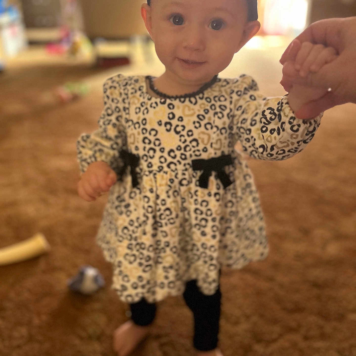 Wrynleigh is registered to the contest to win money with this photo: baby, bodypart, clothing, costume, dress, face, fashion, finger, formalwear, hand, happy, head, indoors, pants, pattern, person, photography, portrait, smile, standing