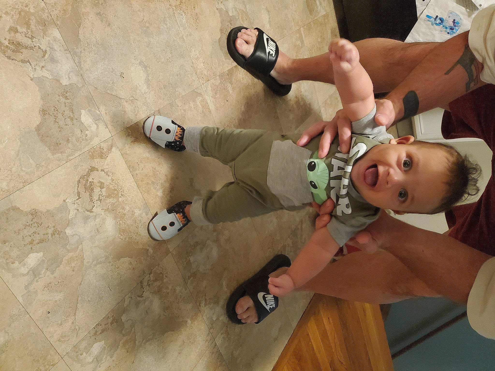 Frederick joined the competition — help win amazing prizes! arm, chest, elbow, eyewear, finger, floor, flooring, fun, hand, human_leg, joint, knee, leg, leisure, person, recreation, shorts, sneakers, surprise, thigh