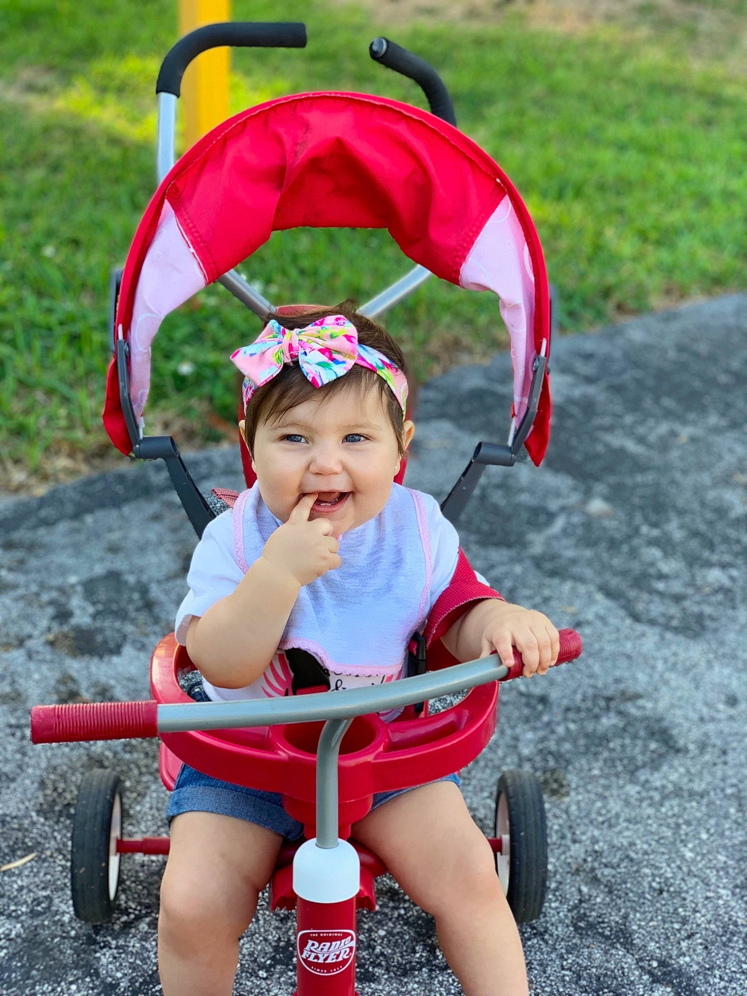Melody joined the competition — help win amazing prizes! baby_products, child, fun, happy, headwear, joy, person, plant, play, product, red, smile, summer, toddler, tricycle, vacation, vehicle