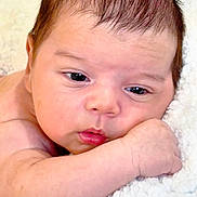 Lian joined the competition — help win amazing prizes! baby, infant, face, skin, arm, hand, eyes, mouth, blanket, soft, closeup, portrait, resting, newborn, cute, expression, sleepy, indoors, child, peaceful