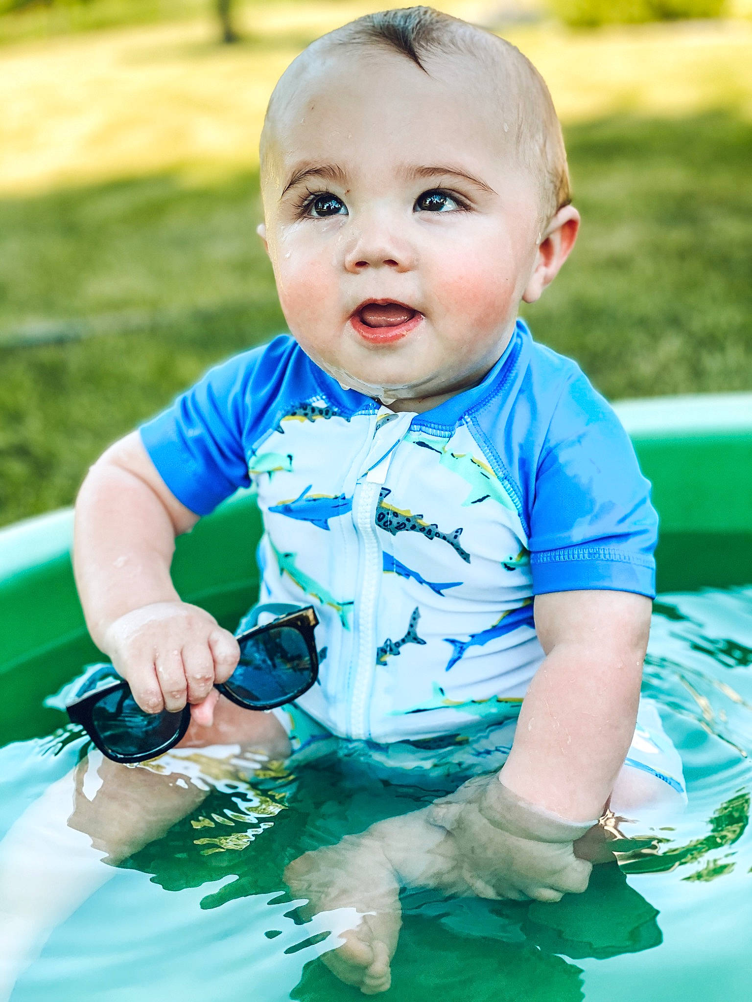 Oakland is registered to the contest to win money with this photo: baby, baby_products, baby_toddler_clothing, blue, child, eye, fun, grass, green, happy, leisure, person, play, product, recreation, skin, smile, summer, toddler, vacation