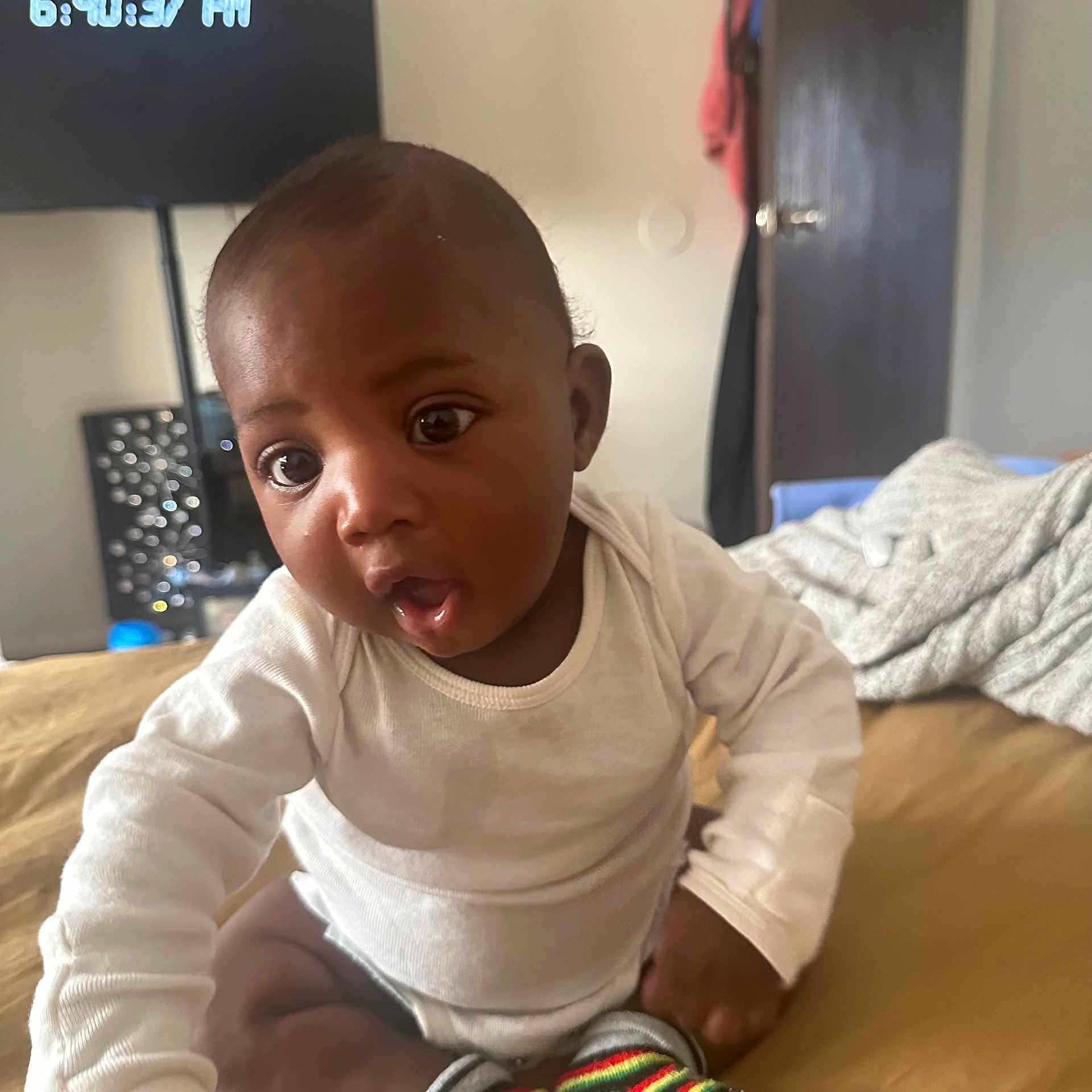 Boosie is registered to the contest to win money with this photo: baby, babylaughing, computerhardware, crawling, electronics, face, happy, hardware, head, monitor, person, sad, screen