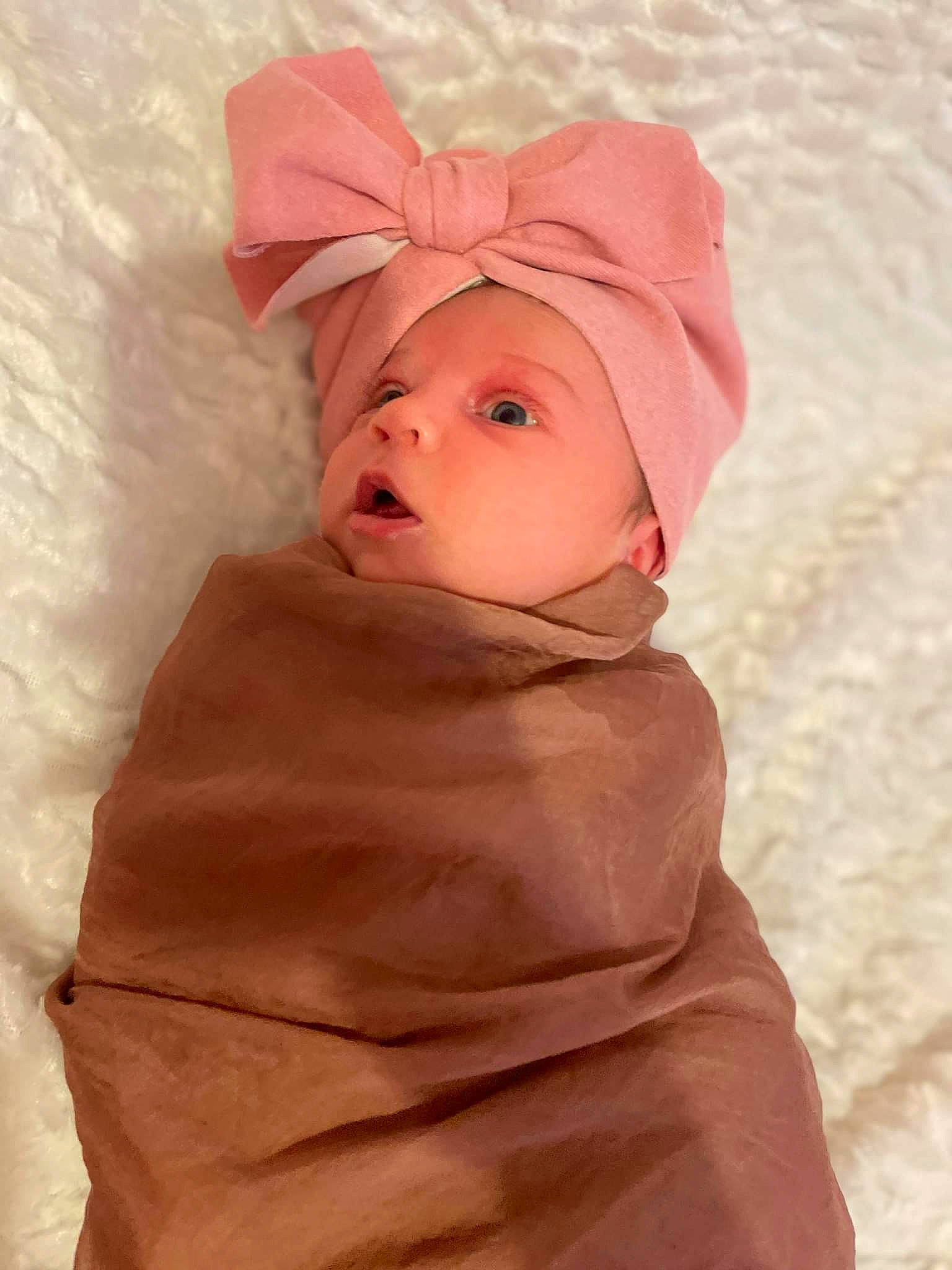 Méladi participe au concours pour gagner de l'argent avec cette photo : baby, baby_toddler_clothing, cap, carmine, cheek, child, comfort, fun, fur, hat, headwear, linens, peach, person, pink, sleeve, toddler