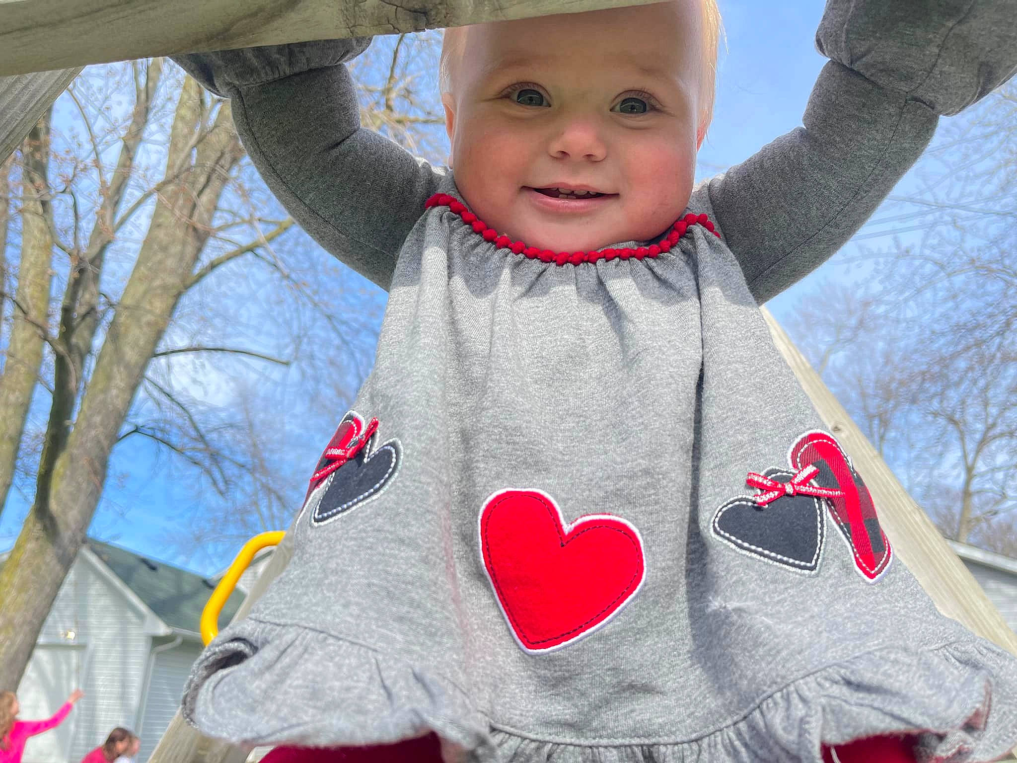 Paislee is registered to the contest to win money with this photo: baby_toddler_clothing, fun, happy, hat, headwear, joy, leisure, magenta, organ, pattern, people, person, photograph, pink, red, sky, sleeve, smile, textile, toddler