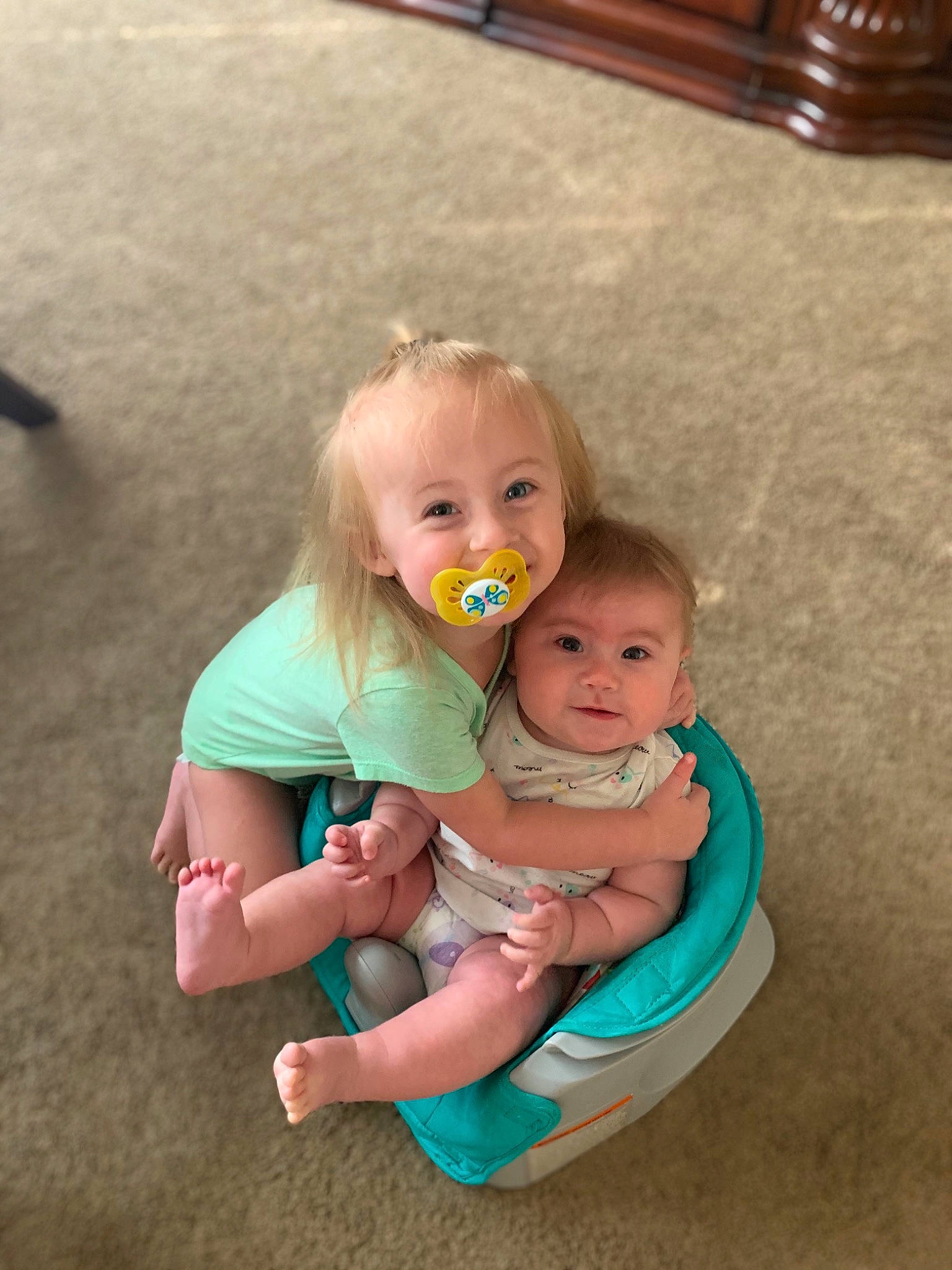 Lively is registered to the contest to win money with this photo: baby, child, family, fun, leisure, person, play, product, sibling, sitting, skin, toddler, vacation