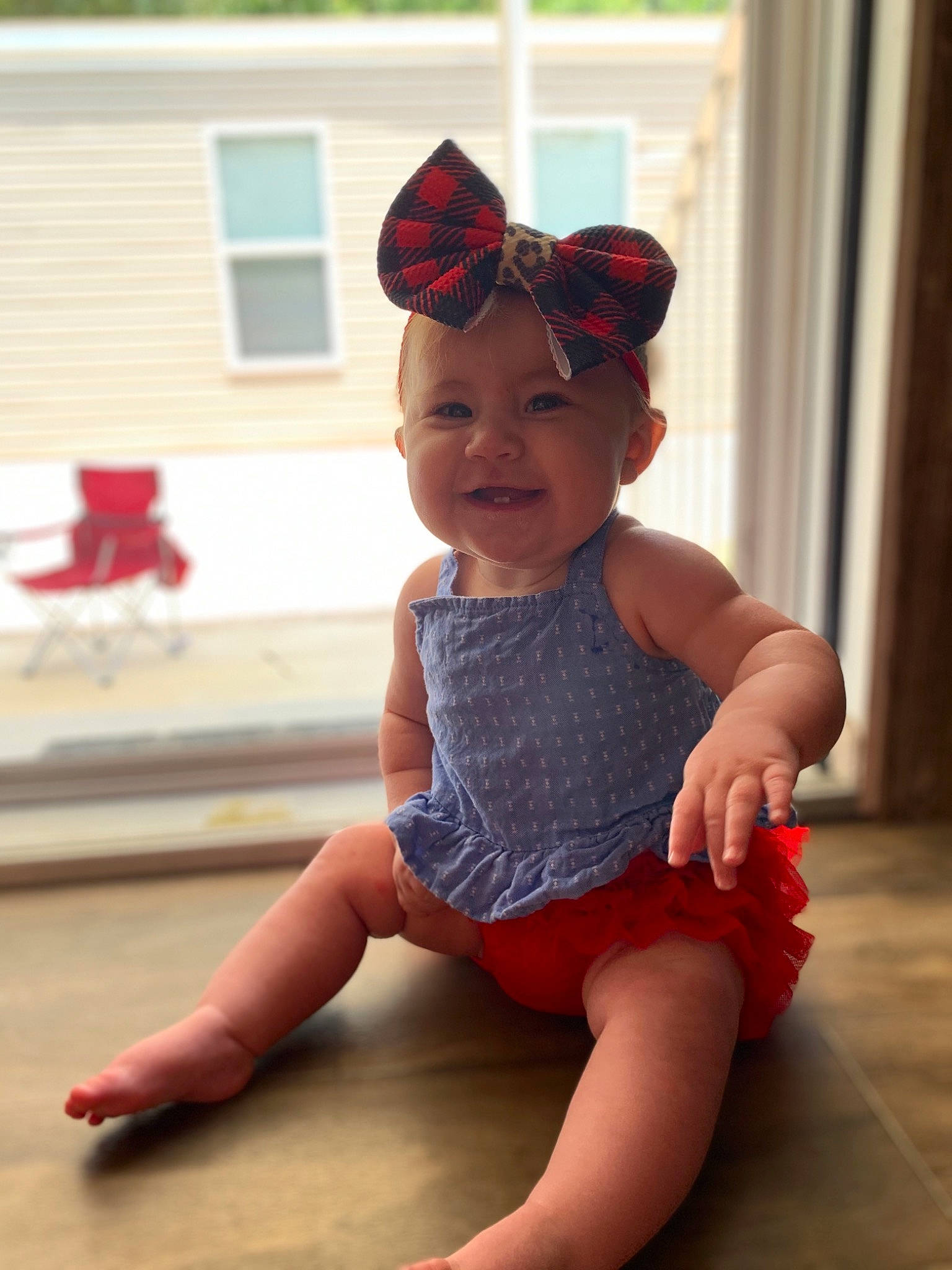Taizleigh joined the competition — help win amazing prizes! arm, baby, baby_toddler_clothing, child, design, floor, hand, hat, headgear, headwear, joy, leg, pattern, person, pink, play, red, shoulder, sitting, skin