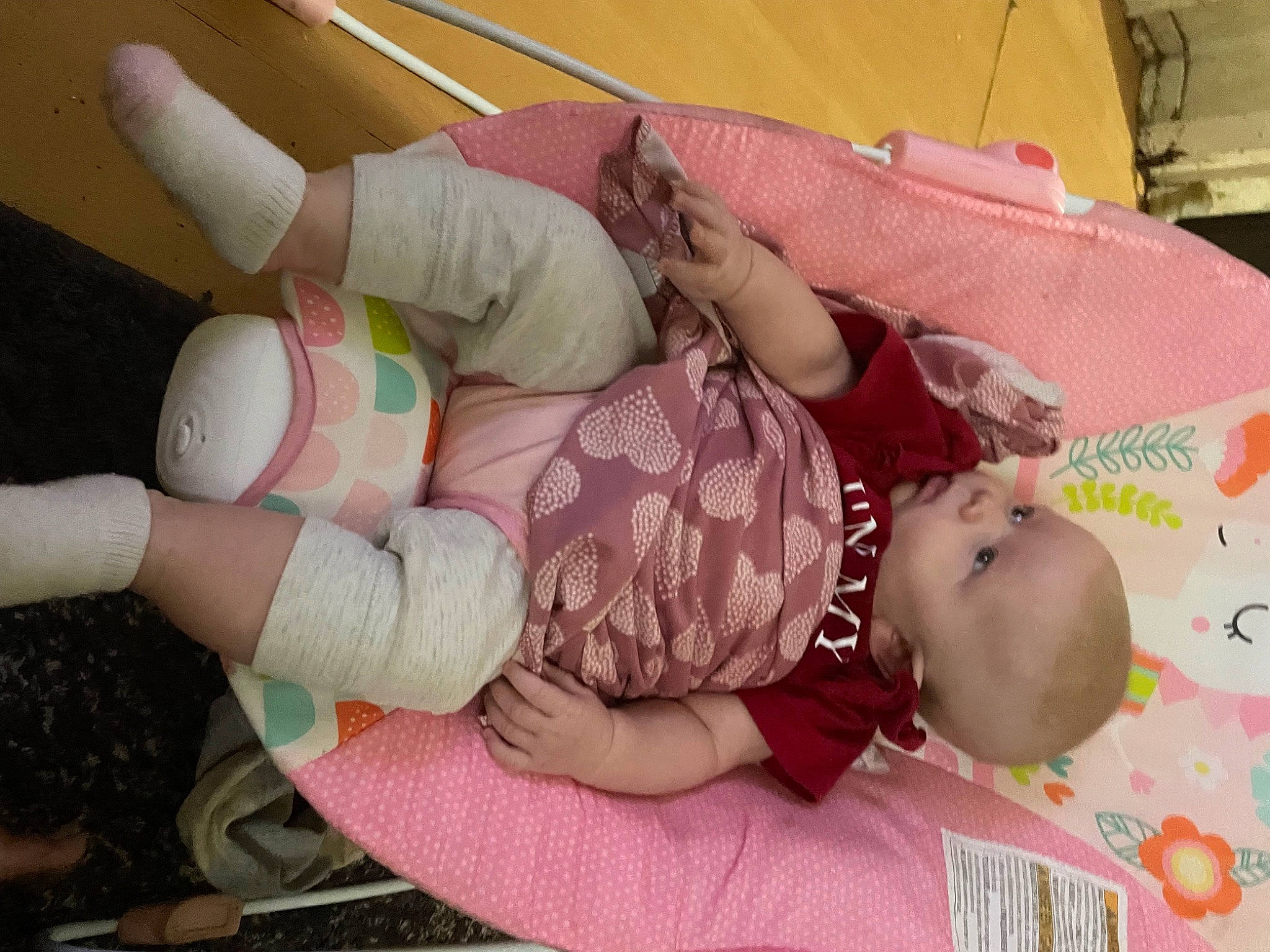 Madison joined the competition — help win amazing prizes! baby, baby_products, baby_toddler_clothing, child, clothing, comfort, finger, foot, gesture, human_leg, knee, nail, pattern, person, pink, sitting, skin, sock, thigh, thumb
