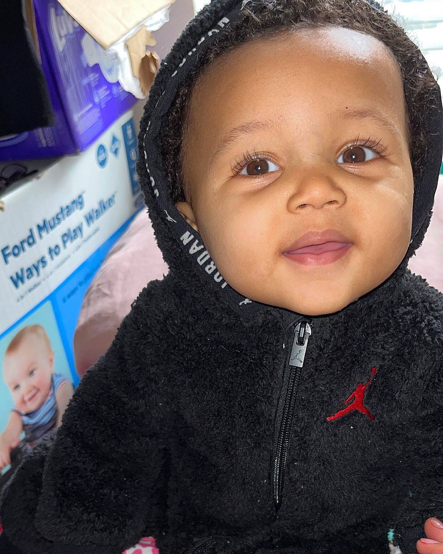 Emmitt Jr joined the competition — help win amazing prizes! audio_equipment, baby, baby_toddler_clothing, cheek, child, ear, eyelash, facial_expression, fashion_accessory, happy, jewellery, joy, nose, organ, outerwear, person, selfie, skin, sleeve, smile