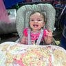 Taylor joined the competition — help win amazing prizes! baby, child, high_chair, cake, birthday, messy, pink, smile, face, food, party, celebration, seat, clothing, happy, crumbs, frosting, indoor, person, toddler