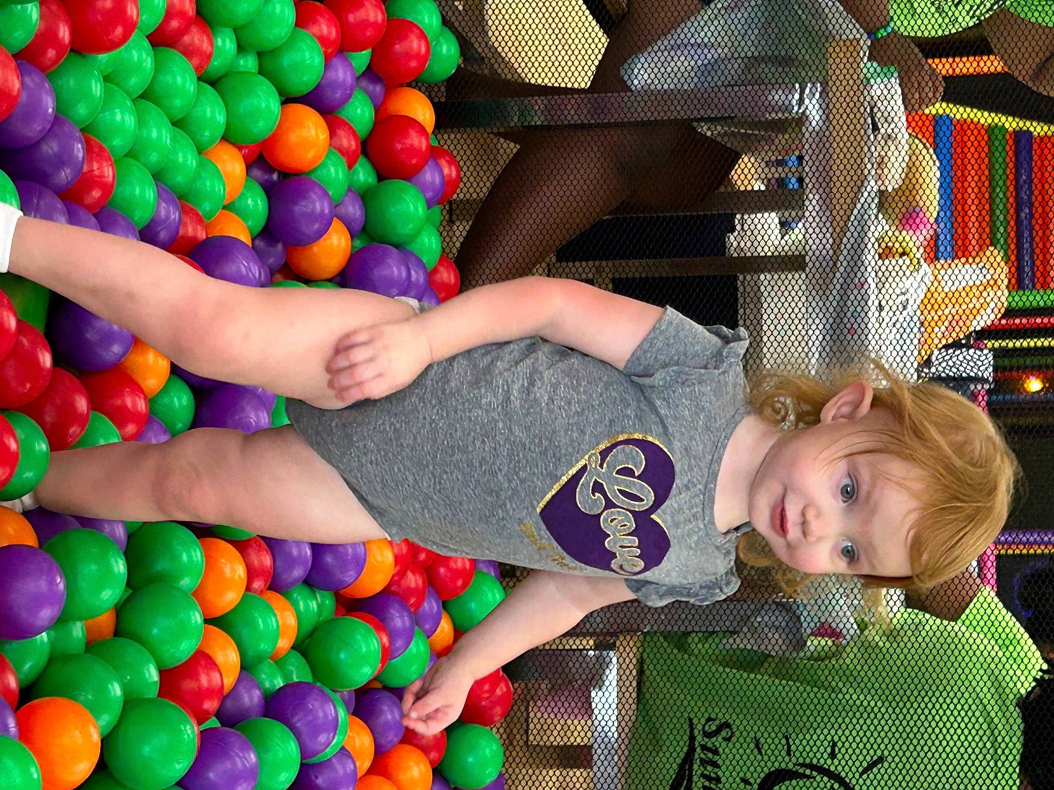 Lucy joined the competition — help win amazing prizes! baby_toddler_clothing, ball, ball_pit, child, event, fun, green, happy, leisure, party, pattern, people, person, play, product, smile, snapshot, sweetness, toddler, toy