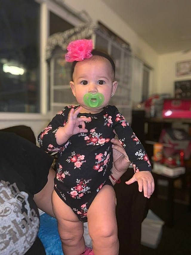 Lluvia joined the competition — help win amazing prizes! baby, cheek, child, costume, head, joint, person, pink, skin, sleeve, textile, toddler