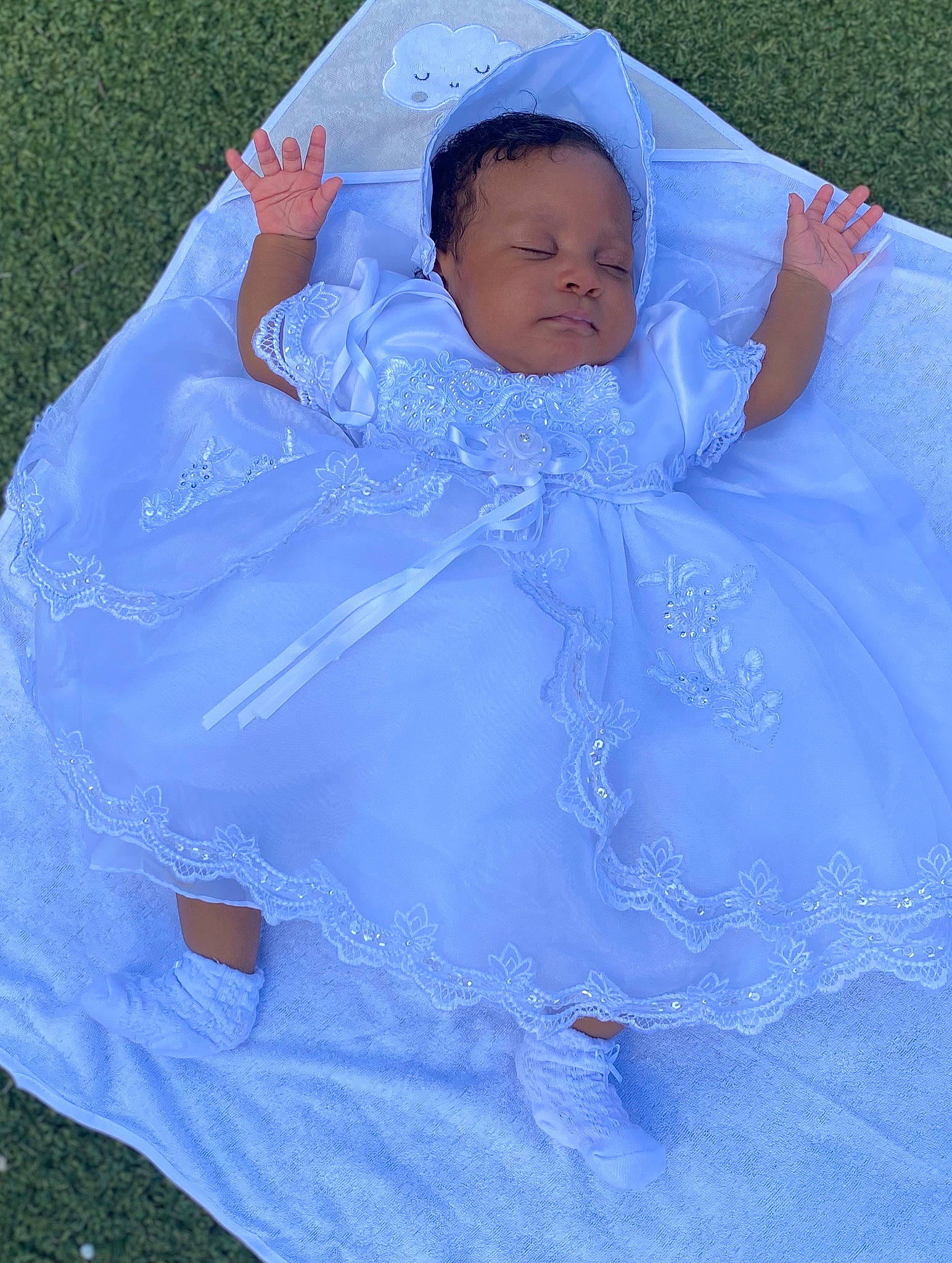 Eliana joined the competition — help win amazing prizes! baby, baby_products, blue, child, grass, outerwear, person, product, sleeping_bag, textile