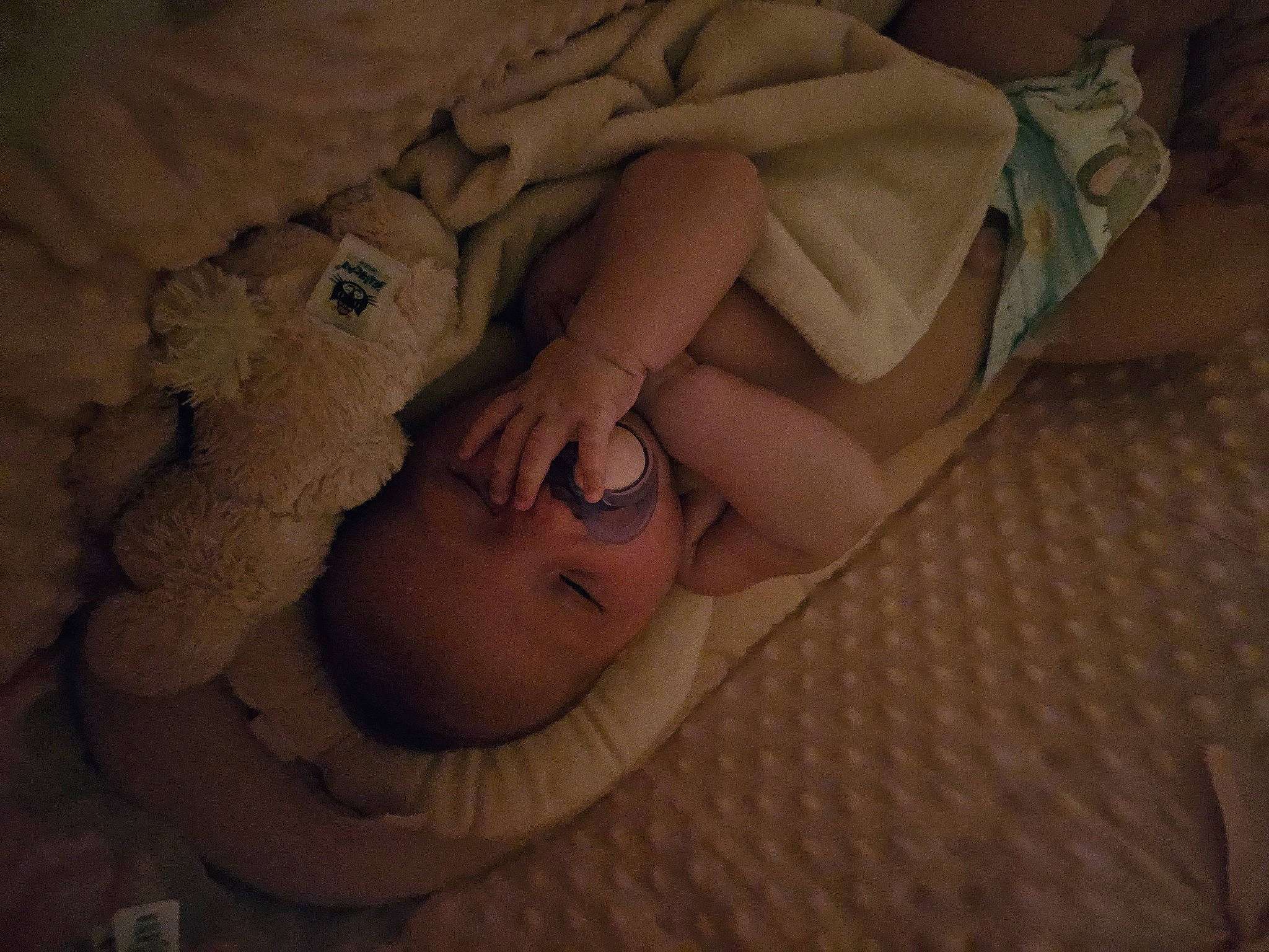 Arya is registered to the contest to win money with this photo: arm, baby_sleeping, bed, bedding, bedtime, chest, comfort, eye, eyelash, face, flash_photography, gesture, head, human_body, human_leg, linens, nail, person, thigh, wood