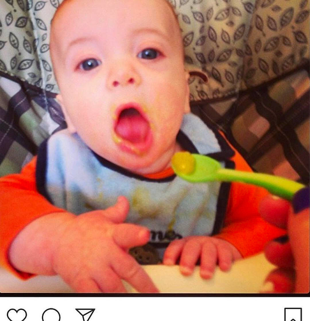 Carter is registered to the contest to win money with this photo: baby, baby_laughing, baby_making_funny_faces, cheek, child, comfort_food, eating, face, facial_expression, finger, food, hand, head, lip, mouth, nose, person, photo_caption, play, smile