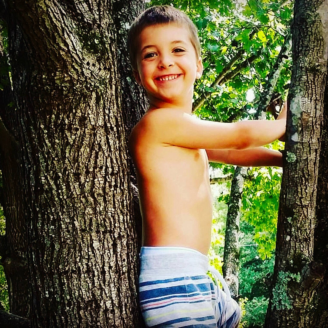 Carter joined the competition — help win amazing prizes! arm, beauty, branch, child, child_model, happy, joy, male, muscle, people_in_nature, person, photo_shoot, photography, plant, skin, smile, summer, sunlight, tree, trunk