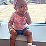 Jyleenia joined the competition — help win amazing prizes! baby, cars, cheerful, child, cute, daylight, denim_shorts, footwear, indoor, pacifier, person, pink_headband, pink_shirt, pink_sneakers, sidewalk, sitting, toy, urban, window, windowsill