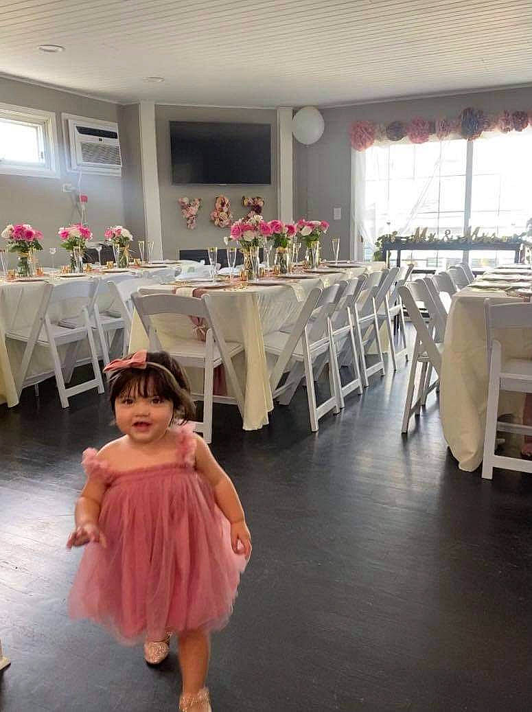 Naiya joined the competition — help win amazing prizes! ceiling, chair, decoration, design, dress, event, floor, flooring, flower_arranging, function_hall, furniture, hall, linens, person, plant, room, sandal, table, tablecloth, textile