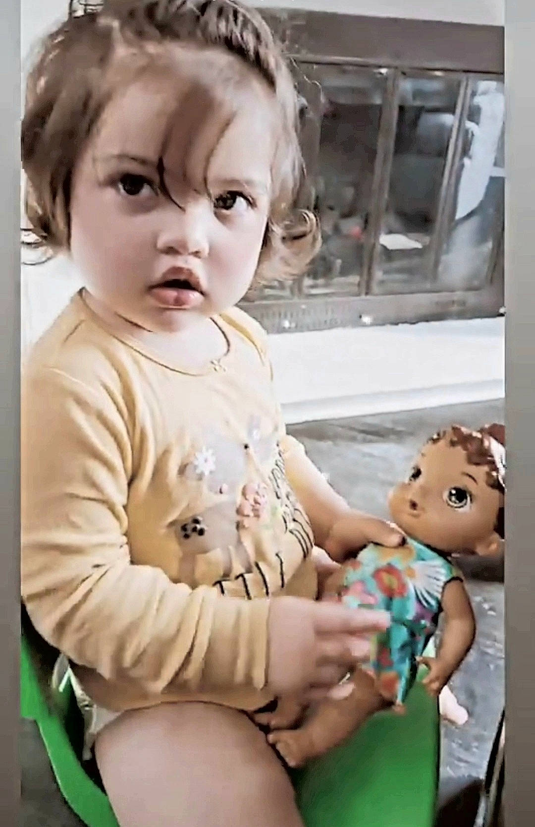 Naiya is registered to the contest to win money with this photo: arm, baby_toddler_clothing, cheek, dress, eye, gesture, hair, hairstyle, hand, happy, human_body, iris, lip, mouth, neck, nose, person, shoulder, skin, sleeve